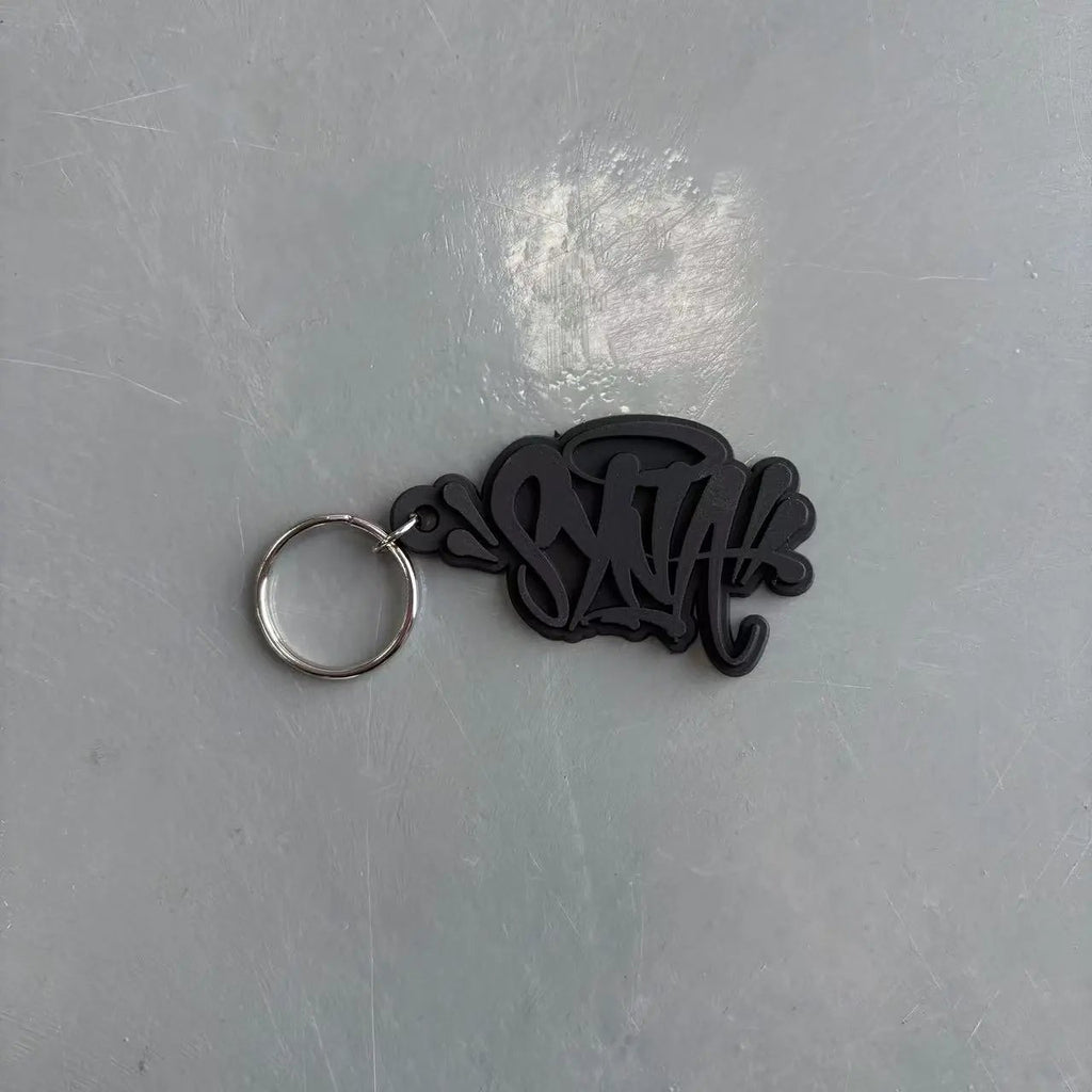 Syna W0rld KeyChain